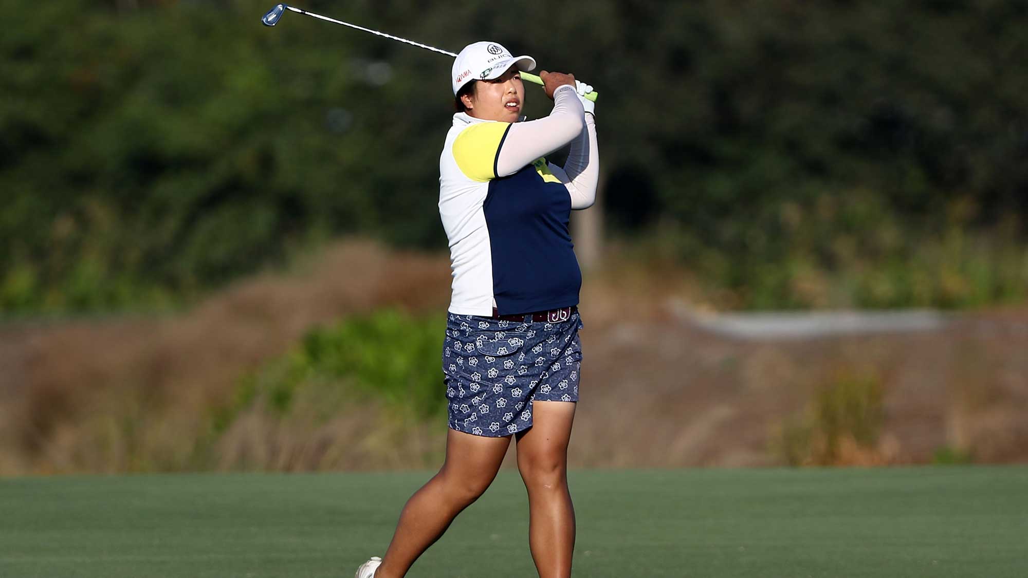 Shanshan Feng of China plays her second shot on the 18th hole during the first round of the CME Group Tour Championship at Tiburon Golf Club